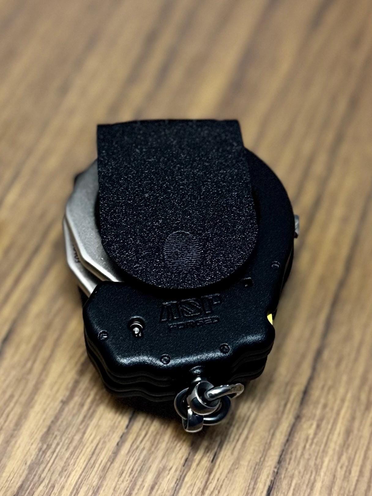 Tactical Locking Handcuff Holder: Secure TPU Police Gear