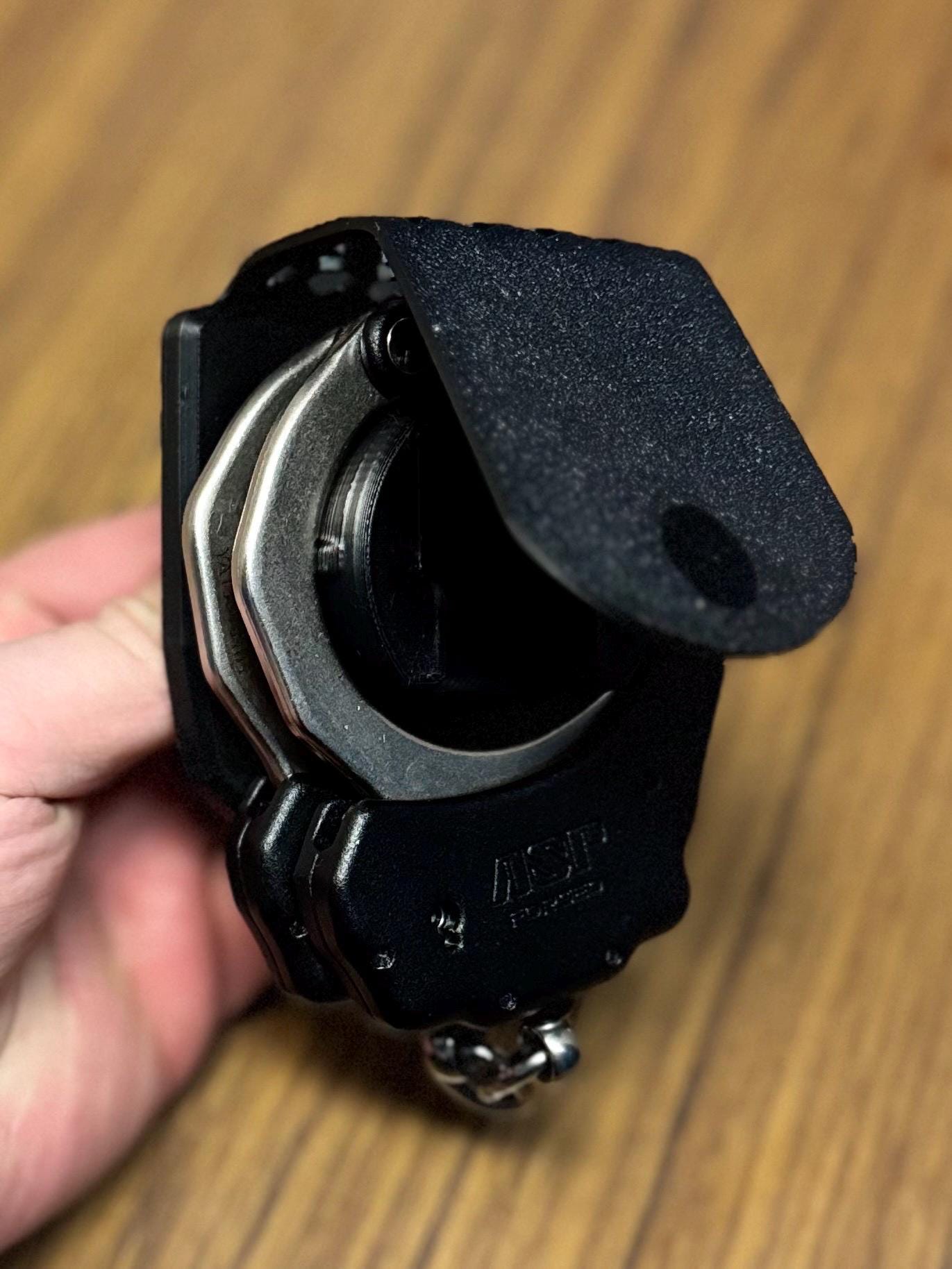 Tactical Locking Handcuff Holder: Secure TPU Police Gear